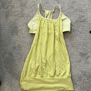 Yellow Lulu Lemon tank top.